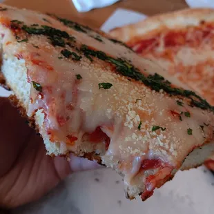 Sicilian sice, cheese, and pepperoni