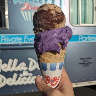 Kare almond fudge and ube ice cream in a waffle cone