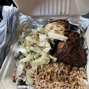 Jerk chicken fried cabbage rice and beans