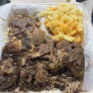 Oxtails rice beans Mac and cheese