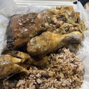 Jerk chicken rice beans cabbage