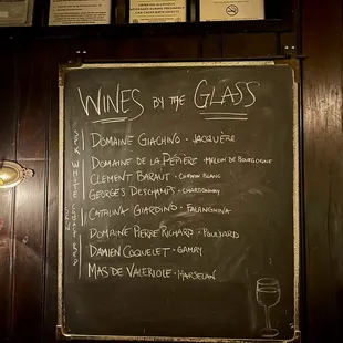 a blackboard with a list of wines on it