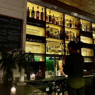 a bartender at the bar