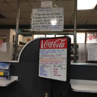 Menu boards for breakfast and lunch/dinner.