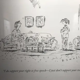 Another wall hanging in the water closet.