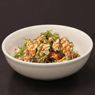 a bowl of asian food