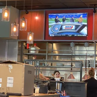 Weird box on table and open kitchen concept in the background