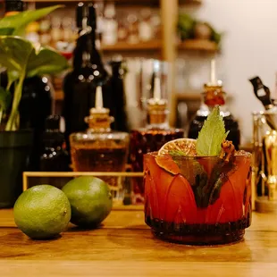 a glass of marmalade and limes