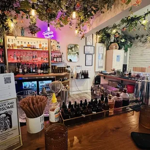 a bar with a variety of bottles of liquor