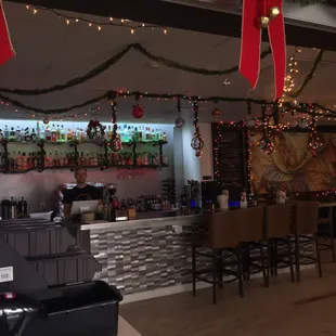 a bar with christmas decorations