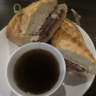 a sandwich and a cup of coffee