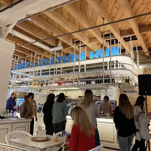 a group of people sitting at tables