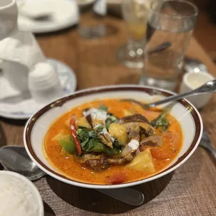 a bowl of soup and rice