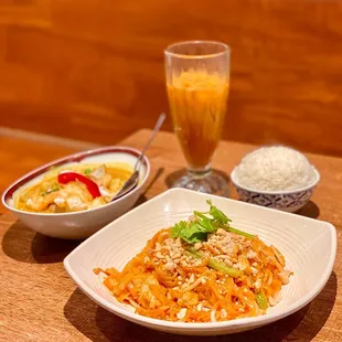 banana yellow curry with prawns, chicken pad thai, thai tea, one bowl of rice (09/2022)