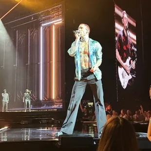 a male singer on stage