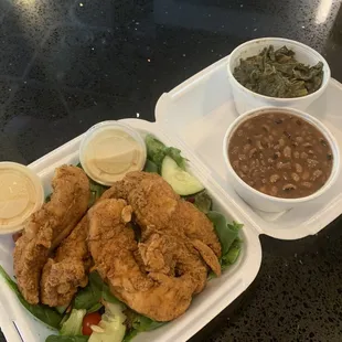 House salad with chicken. White French dressing black eyed peas and greens.