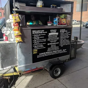 a food cart on a city street