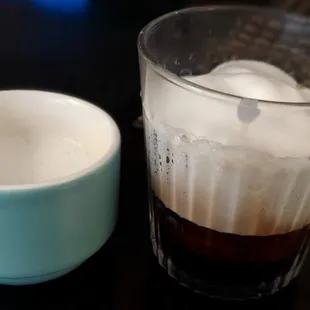 a cup of coffee and a mug of ice