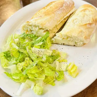 a sandwich and salad on a plate