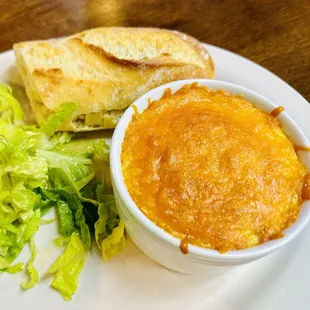 a plate of food with bread and salad