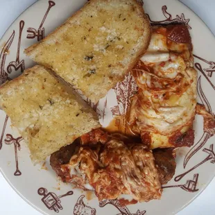 Manicotti, Italian Sausage, and Garlic Bread