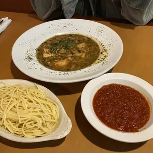 Chicken Marsala with a side of meat sauce