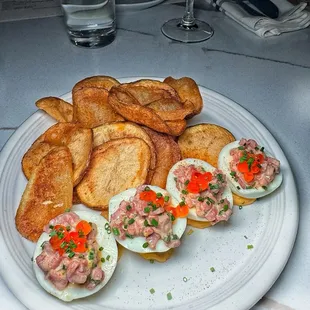 Steak Tartare deviled eggs + chips