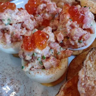 Steak tartar, salmon row deviled eggs. Why are their house made chips so flavorful???