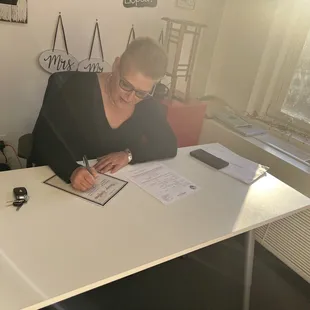 Victoria signing the marriage certificate