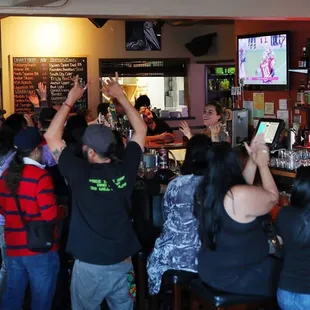 Sports on the TV's at the bar.  Go niners!