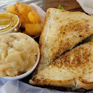 Pastrami on sourdough, warm German potato salad and fresh cheese curds.