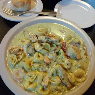 The special - grilled chicken, shrimp, cheese tortellini, sun dried tomatoes in cream pesto sauce. So satisfying!!