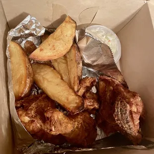 Chicken dinner. With jojos and coleslaw