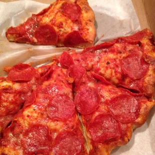 two slices of pepperoni pizza