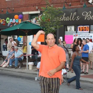 a man holding up a sign