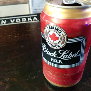 a can of black label beer