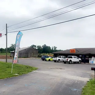 trucks parked in front of the store