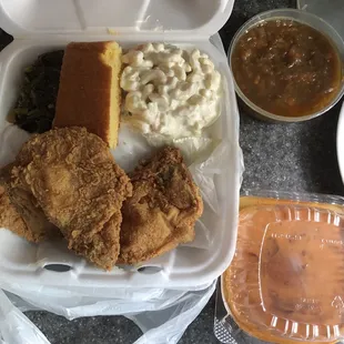 2 chops, Yams, macaroni salad, greens, cornbread and a mixture of two of their sauces. Don&apos;t know what it was but it&apos;s good.