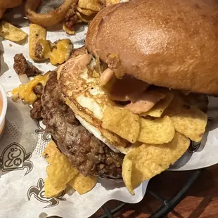 Burger, bison chili, Fritos, added the egg.  The portions are good! Yum!