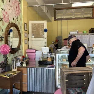 a woman standing at the counter