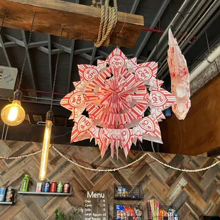 Homemade down to the popcorn bag star decoration!