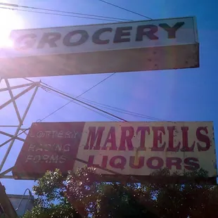 a sign for a grocery store