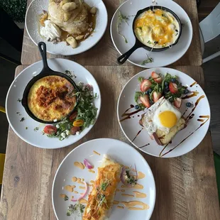 four plates of food on a table