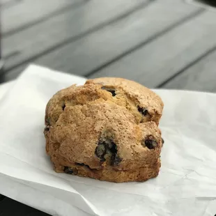 a muffin on a napkin