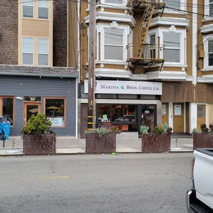 a truck parked in front of a building