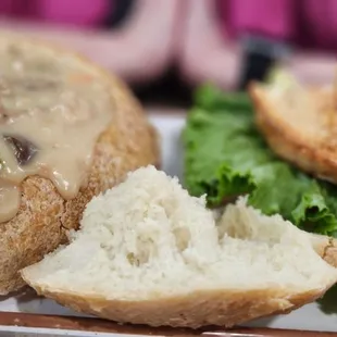 Turkey sandwich with clam chowder in a bread bowl