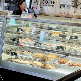 a woman behind the counter