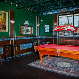 a pool table in a bar