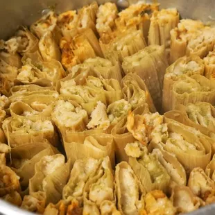 Pork, chicken, beans, green pepper and cheese tamales. We also have sweet tamales.