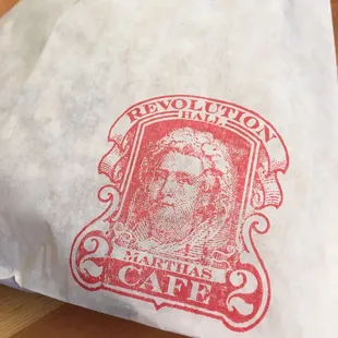 Stamp on takeaway bag.